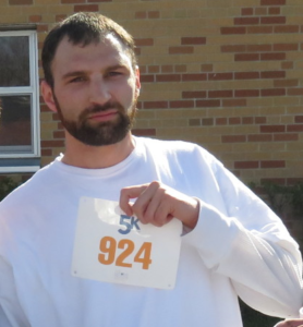 Second chances st. paul - Matt poses proudly with his 5K race number