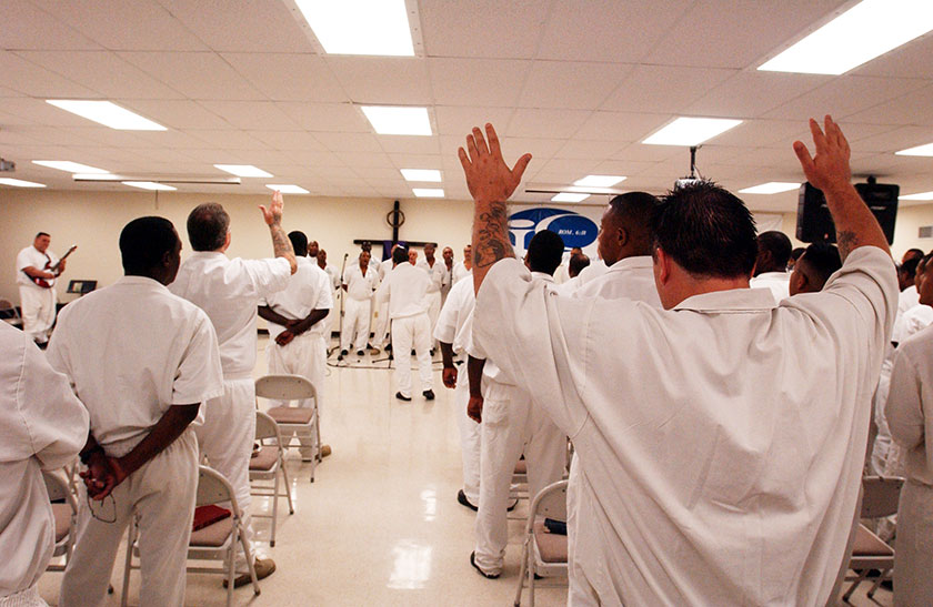 prisoners worship and pray