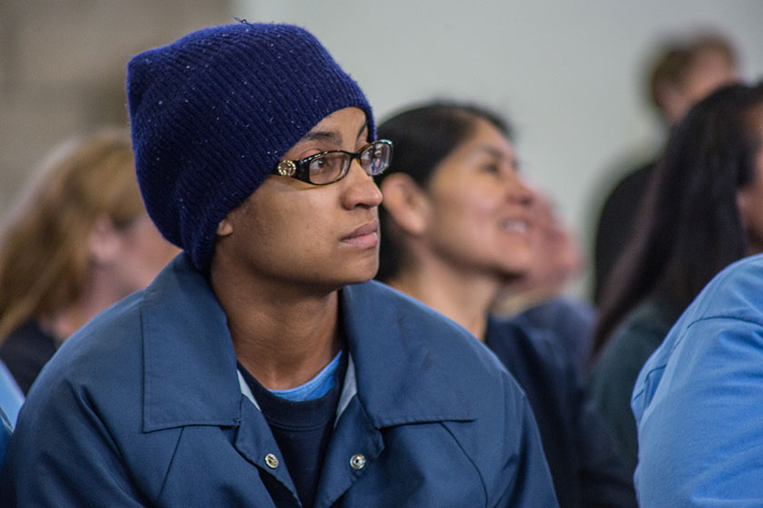 female prisoner listens at hope event