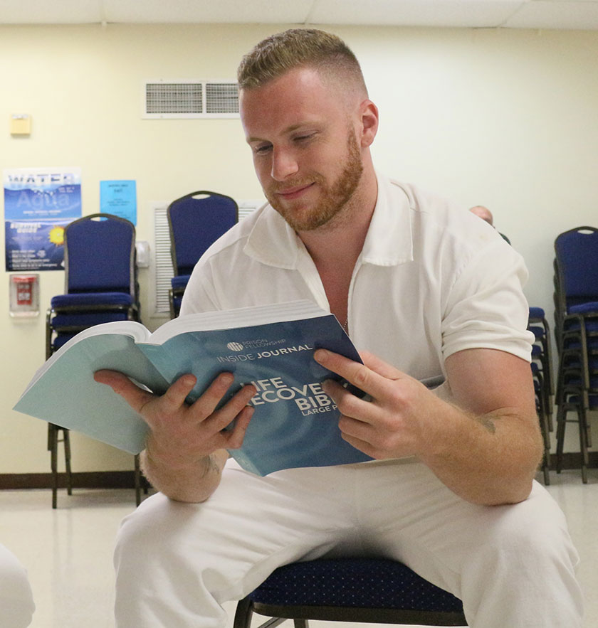prisoner reads life recovery bible provided by prison fellowship