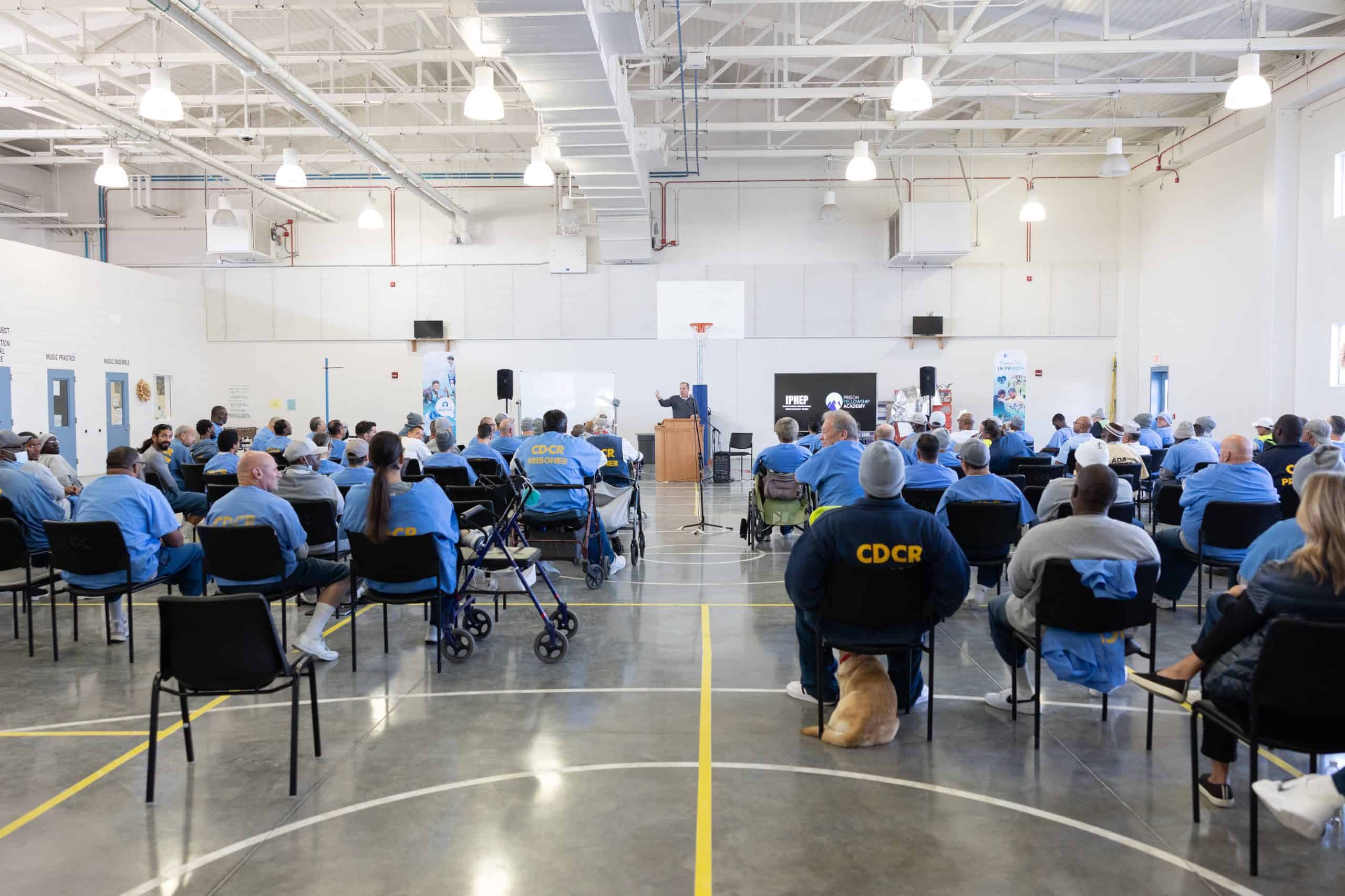 Prison Fellowship CEO James Ackerman speaking at a prison.